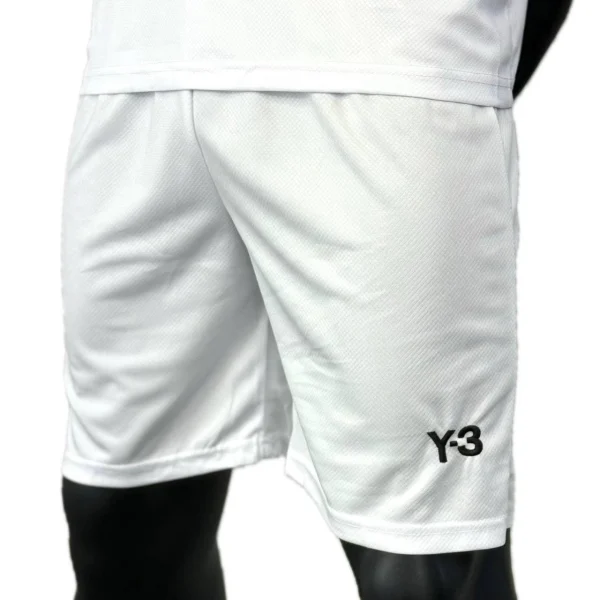 کیت رئال مادرید سفید طرح گل 2025 - سون اسپرت