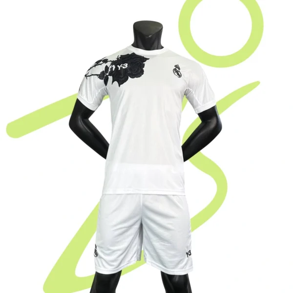 کیت رئال مادرید سفید طرح گل 2025 - سون اسپرت