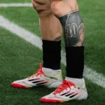 کفش استوکدار f50 اختصاصی مسی 2026 سفید نارنجی - سون اسپرت